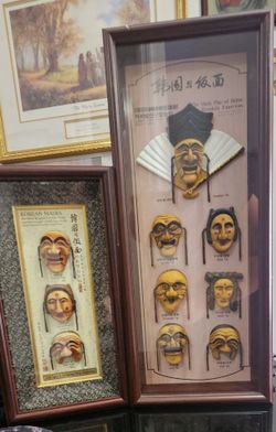 framed shadow boxes feature miniature Korean Hahoe masks