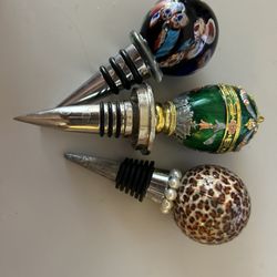 Nice group or set of three fancy really nice bottle stoppers