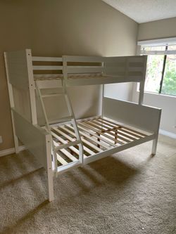 Twin/full bunk bed. Available in white & black.Assembly required. Assembly not included. Tax included. Free local delivery. $350 bunk bed only. $550 w