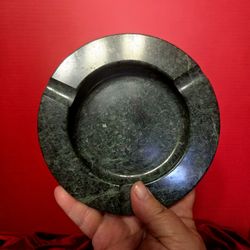 vintage round green marble ashtray, often associated with Mid-Century Modern (MCM) or Postmodern design from the 1970s. 