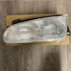 93-97 Geo Prizm New Left Driver side Headlight GM(contact info removed)