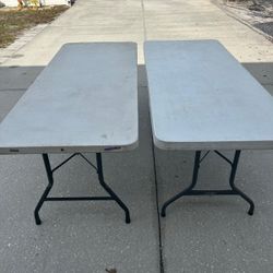 2 white tables 6' with 17 folding chairs 

