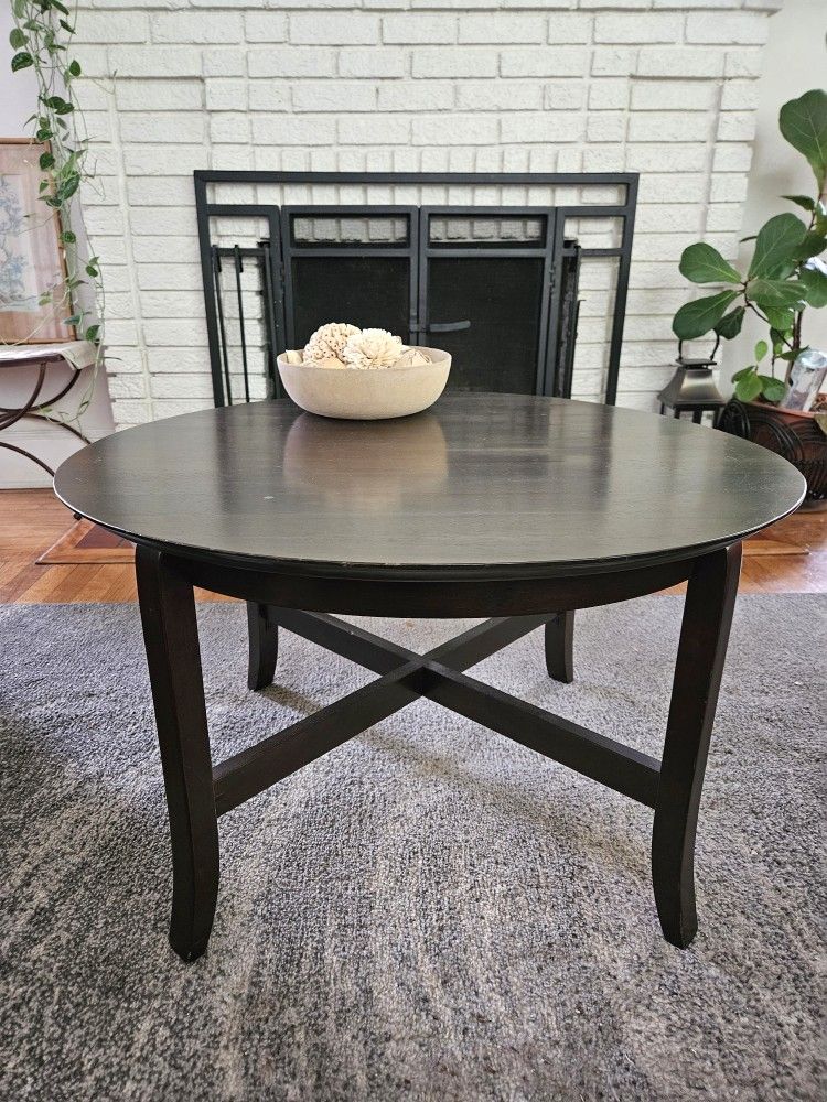 Solid Wood Round Coffee Table In An Espresso Brown Finish