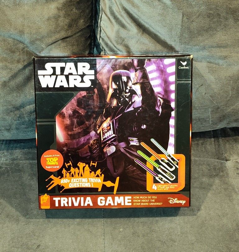 NEW OPEN BOX DISNEY'S STAR WARS UNIVERSE TRIVIA GAME 650+ QUESTIONS & 4 LIGHTSABER PUZZLES TO KEEP SCORE. TEST YOUR KNOWLEDGE! 