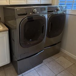 LG Front-Load Washer & Dryer + Pedestals (Graphite Steel)