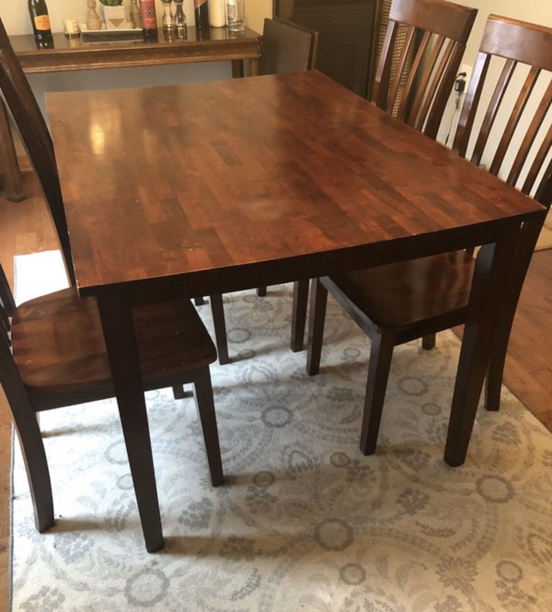 Brown Dining Table and Four Chairs