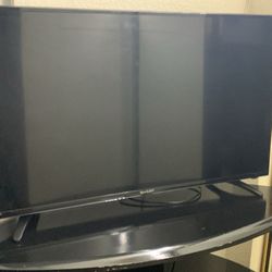 Tv Stand W/40in Roku Tv