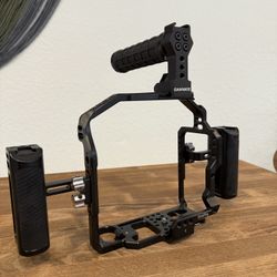 Canon 1DX iii cage, with side handles and top handle.