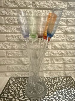 Decorative glass vase with colorful 5 stems, perfect for home decor.