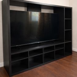 Modern black TV stand / entertainment center in great condition