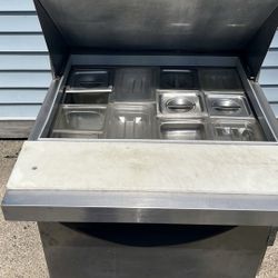 Refrigerator.  Make Subs And Put Vegetables. 