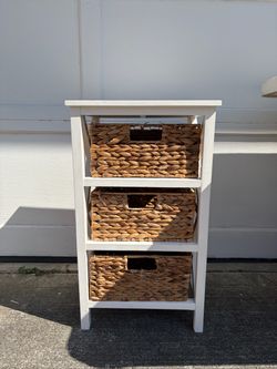 White end table with rattan drawers