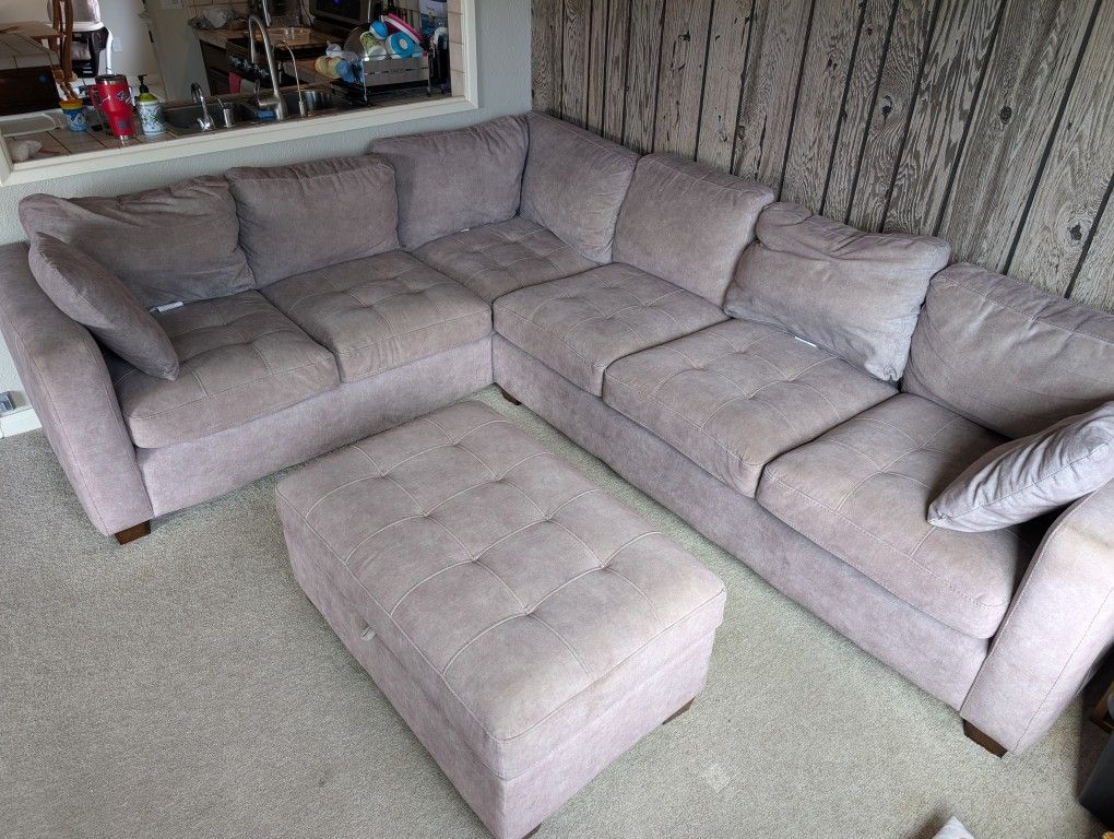 Grey Fabric Sectional and Ottoman (Costco)