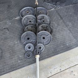 Olympic weight plates 333lbs plus 7ft45lbs bar