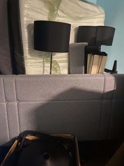 Full size Gray bed frame, mattress still in plastic , floor lamp with black cover