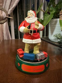 Coca-Cola Santa Claus Seasons Greetings Train Bank Figurine