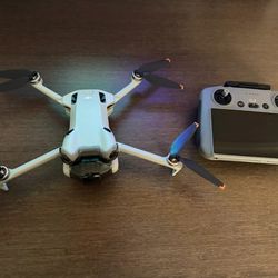 DJI Mini 4 Pro Camera Drone (with RC 2 Remote)