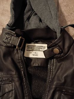 (Chor) Leather jacket with detachable hood.