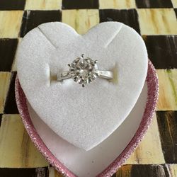 White gold solitaire moissanite by Charles and Clovered