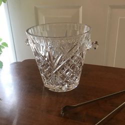 Crystal Ice Cube Bucket with silver grabbers all together for one price it is in Beautiful condition .It is 5.1/2” Tall by 5.7/8” Wide