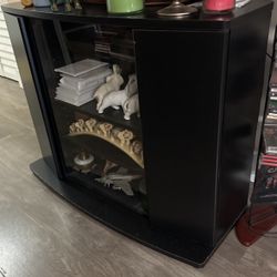 Small TV stand or shelf with compartments