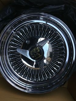 Four INTERO 15x7 wire roadster rims
