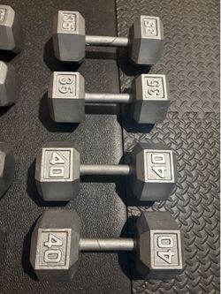 Set of Hex Cast Iron Dumbbells ( heavy) 40#, 35#, 30# and 25 #   In total: 260 pounds.