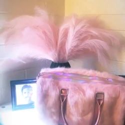 pink fur duffle bag 