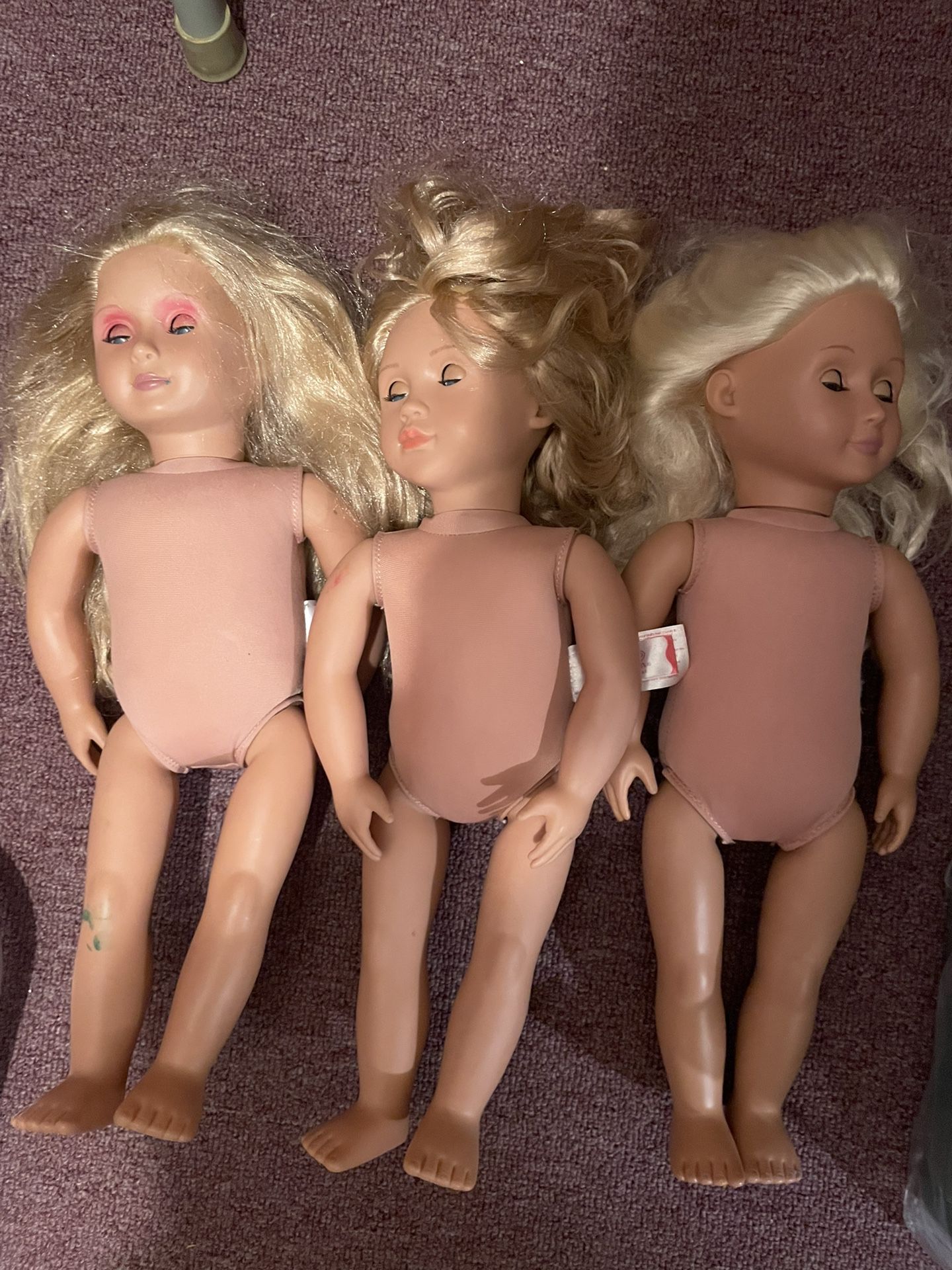 About 25 Dolls