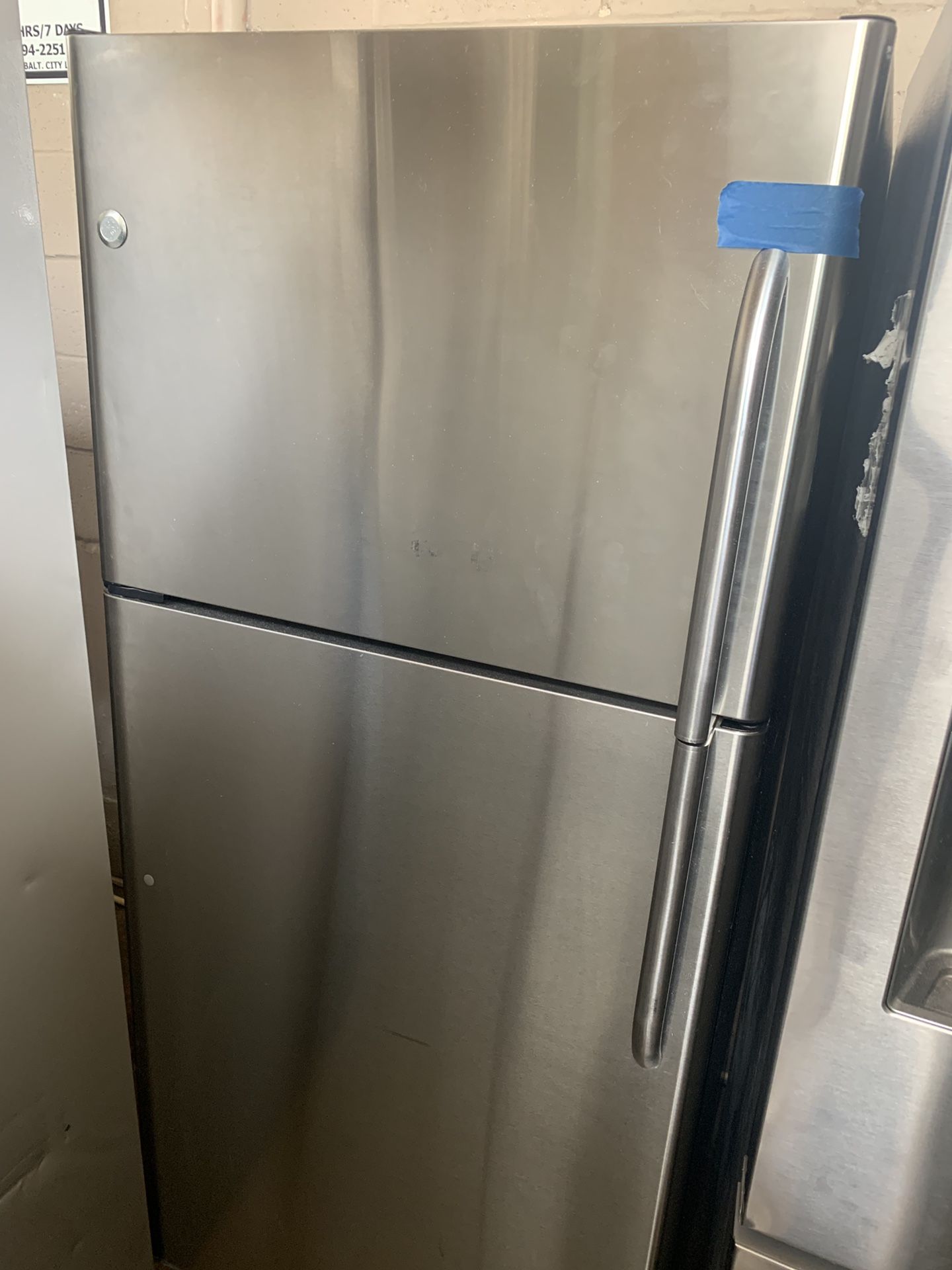 GE stainless steel top and bottom refrigerator working perfectly