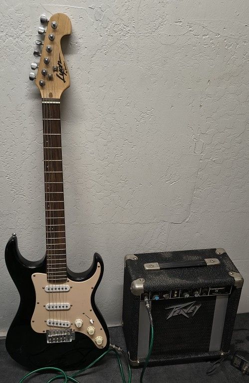Washburn Lyon Electric Guitar with Peavey Amplifier