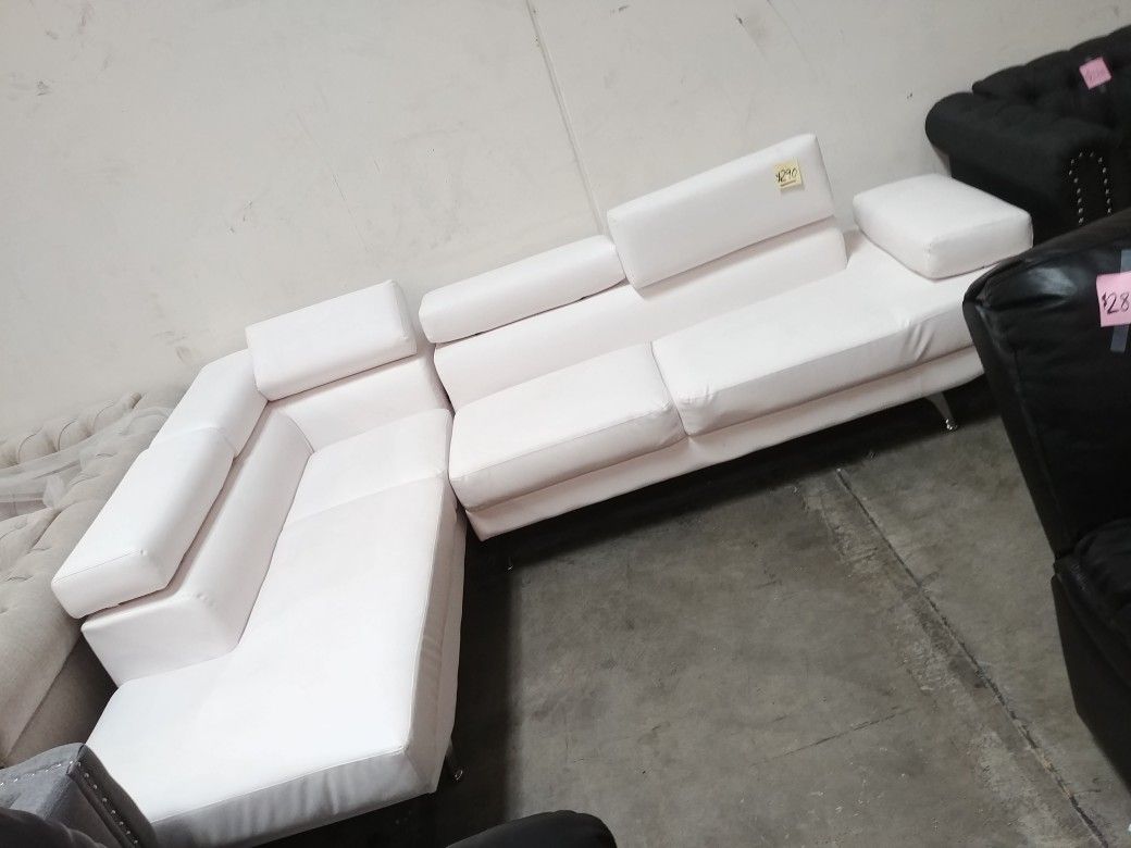 Sectional. Brand new in box. Chaise +couch.