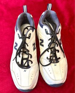 New Balance women’s size 10.5, navy and white—MX608v2