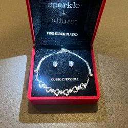 Silver Bracelet And Earrings 