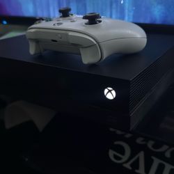 Xbox One X with the control and Games.