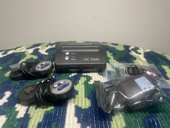 FC TWIN (NES/SNES PLAYER)