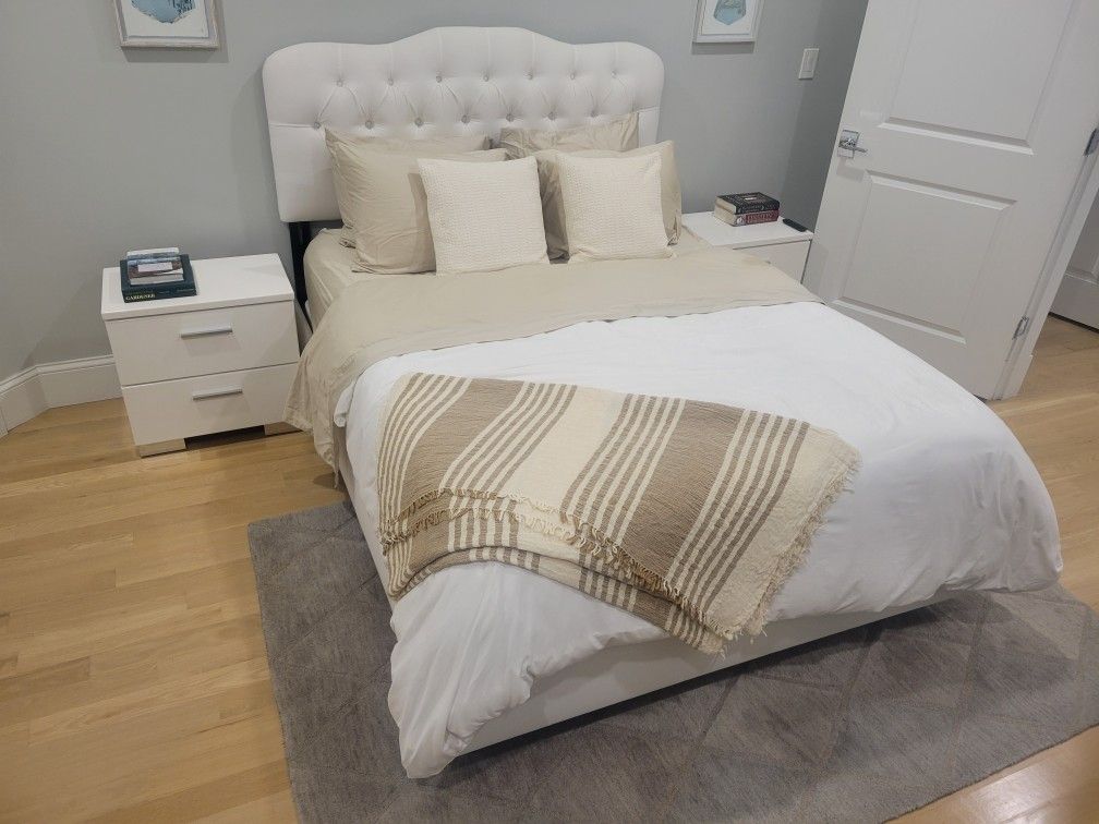 White bed frame and 2 night stands