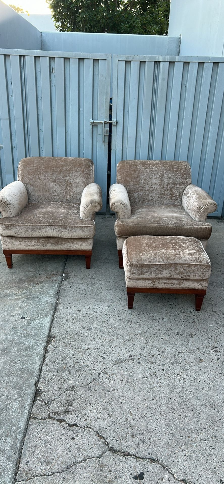 Two Chairs And An Ottoman