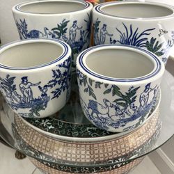 Set: 4 Asian animal pots $120. BLUE & WHITE ceramic planters with drain holes. Swans, Lion, Ibis Bird, Elephant, Palm Trees. 2 Pairs, All 4 Pots $120!