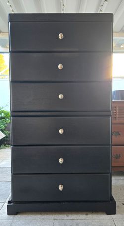Tall wood dresser