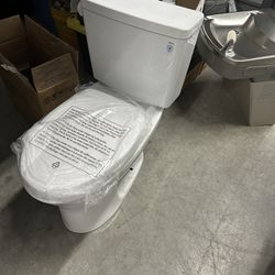 2 Used Toilets With New Seat, (Glacier Bay Dual Flush)