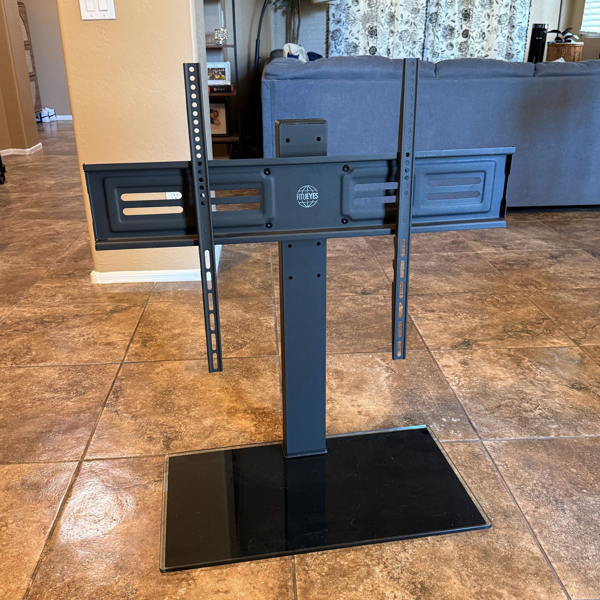 FITUEYES Iron Base Universal Floor TV Stand with Swivel Mount