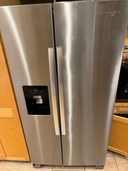 Whirlpool 24.6 cu ft. Side by side refrigerator
