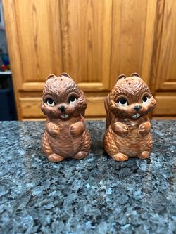Vintage Ceramic Squirrel Pair of Salt & Pepper Shakers.  Bushy Tail Standing Squirrels.  Size approximately 4 inches tall.  Preowned.