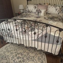 Cal King metal bed frame with upholstered bench