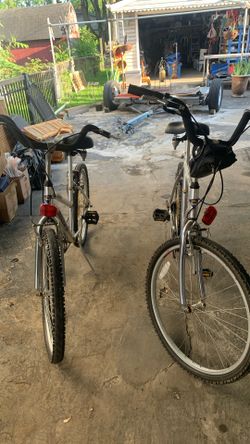 2 Bicycles One For Him And One For Her Silver Color Aluminum