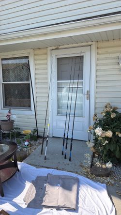 Fishing rods, coolers  outdoors