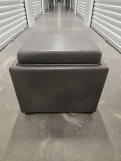 Rectangular foot stool with flip wooden tray