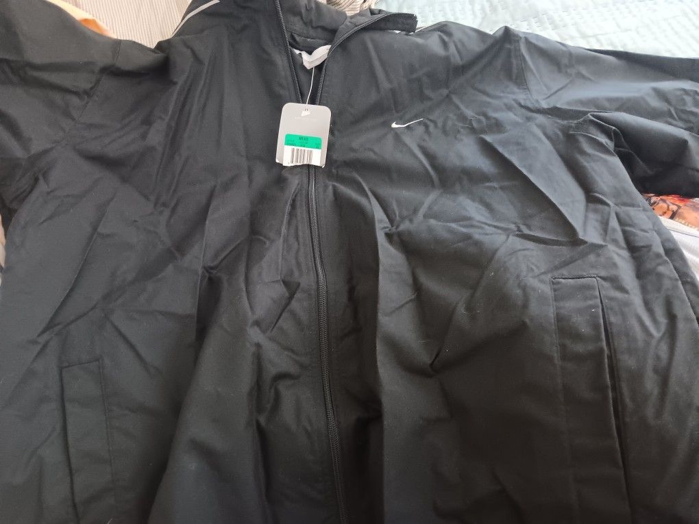 Multiple Windbreakers Shirts Jackets . Never Opened