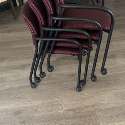 Red chairs with wheels